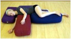 Woman using props for yoga position